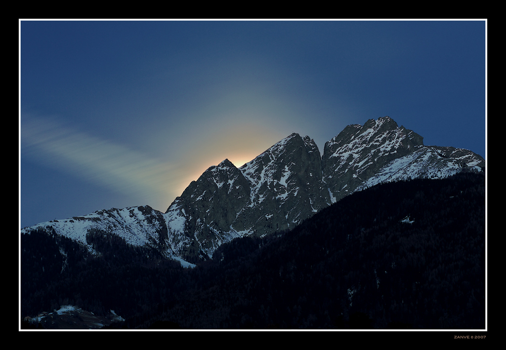 The Moon Behind the Mountain