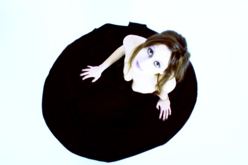 A little black point into light