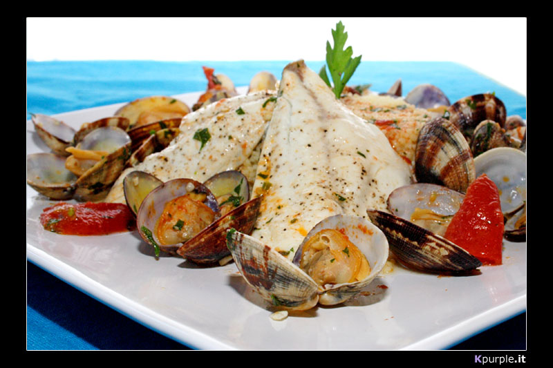 Filetto d'orata con vongole veraci e tortino di cous cous#1