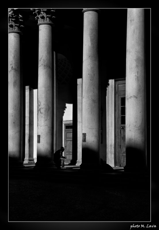 man between columns