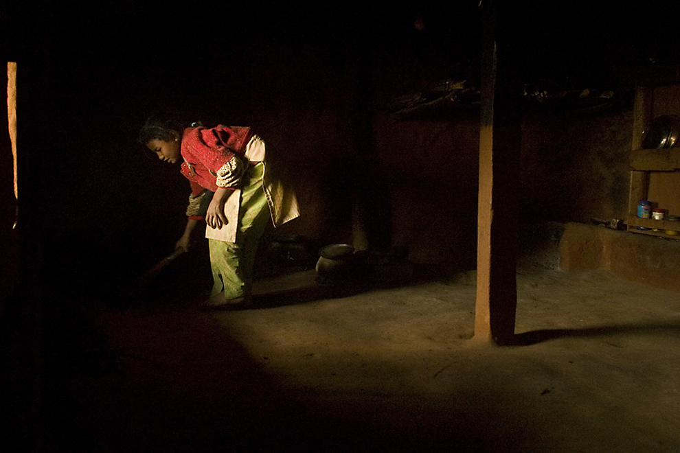 Nepali girl sweeping