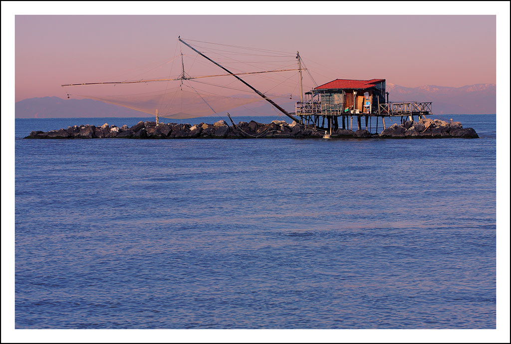 come una rete da pesca asservita alle maree..