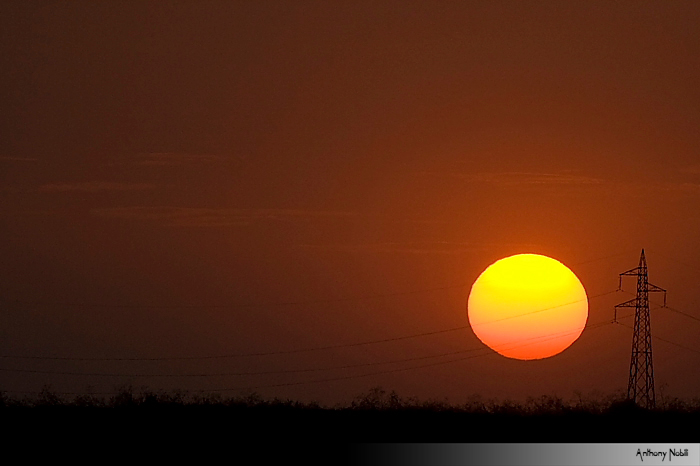 traliccio al tramonto