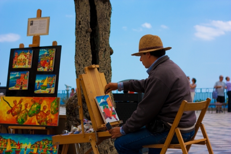 Artista su piazza Taormina