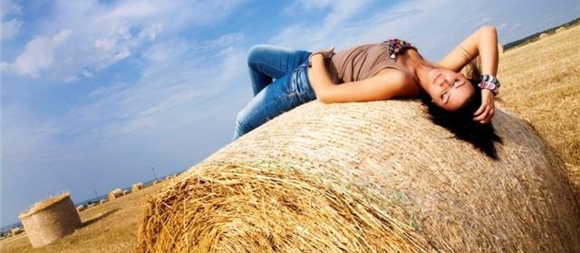 between bales of hay.....