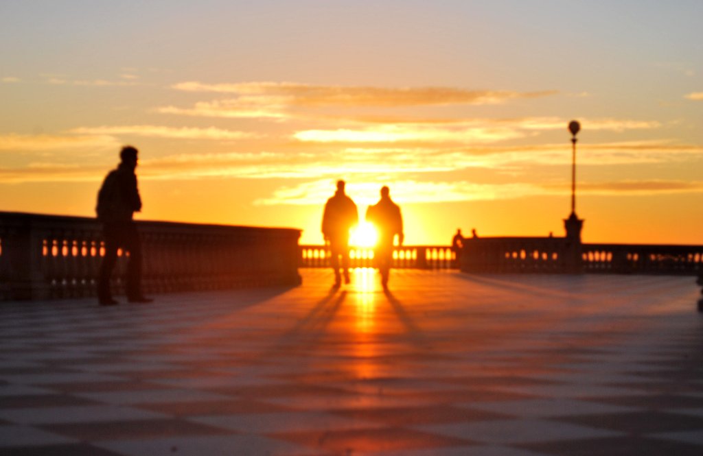 Walking from the sun.