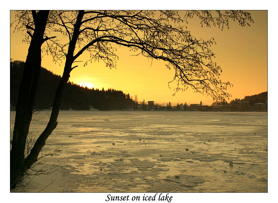 Sunset on iced lake