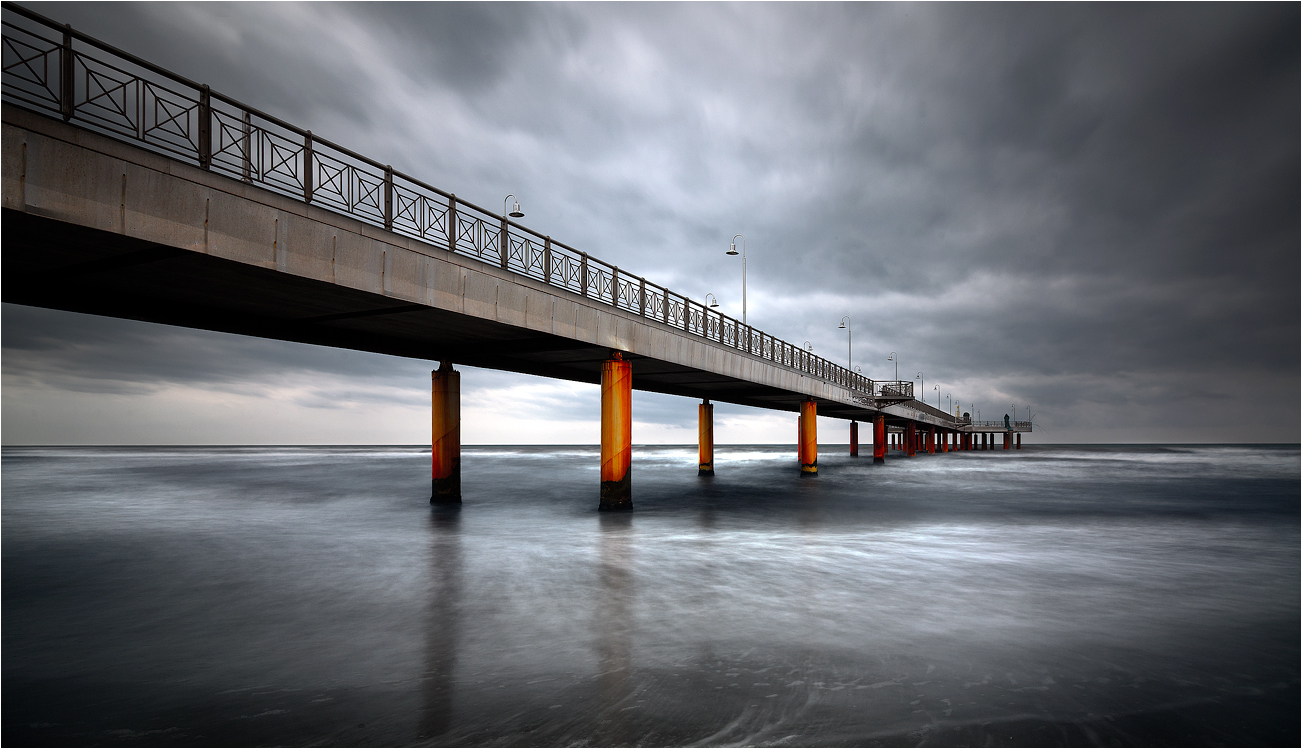 Bridge over the sea in winter