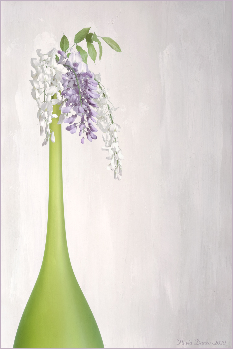 Vaso verde con fiori