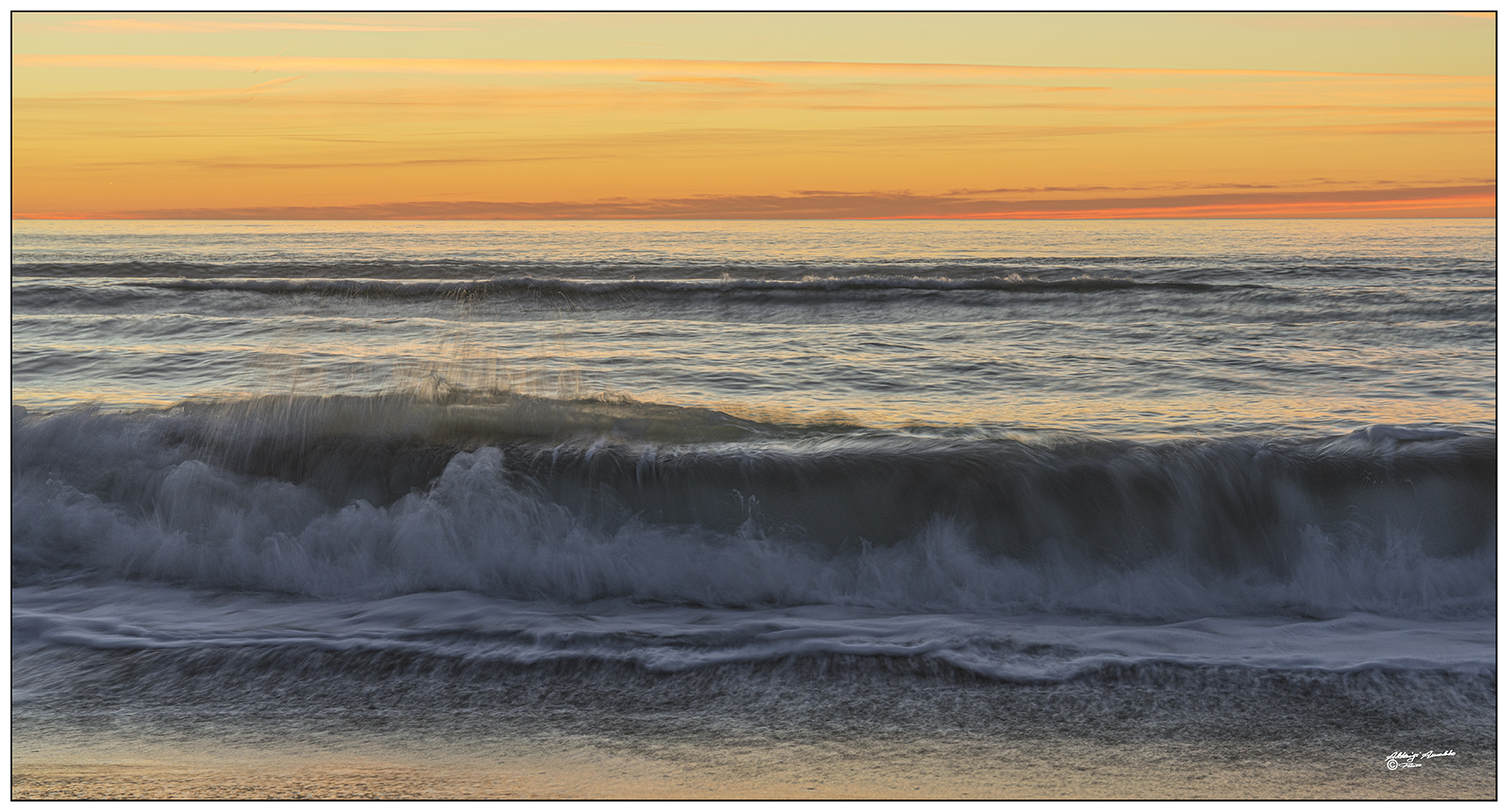 L'onda al tramontar...