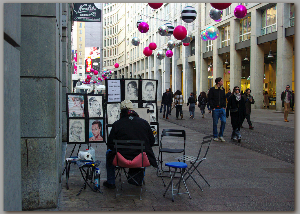 Il ritrattista all'opera......