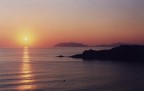 olympus om 10, zuiko 50 mm, paint shop pro, neat image. Capo Milazzo al tramonto sullo sfondo le Isole Eolie