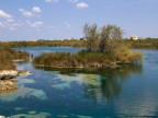 A pochi Km da Porto Cesareo, una laguna di acqua cristallina con un fondale dai mille colori.