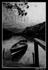 A lake and a boat A lake and a boat