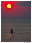 andare in barca a vela al tramonto