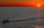 Peschereccio durante il tramonto a Portovenere