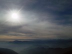 Fotografia scattata a dalla cima del Monte Croce a Nord del Lago d�Orta, mi sono lasciato attrarre dal gioco di luce che si creava tra il sole e la foschia che cominciava a salire tra le montagne.

Dati di scatto:
Fotocamera		Fujifilm Finepix F700
Lunghezza focale	7,7mm
Diaframma		f8
Tempi			1/2000�
Sensore		6,03 Mpixel
Sensibilit�		160 ISO
Note			Correzione dei colori e il contrasto generale.