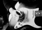 playing the guitar playing the guitar
