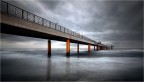 Bridge over the sea in winter Bridge over the sea in winter