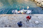 Pescatori allo sgroviglio Pescatori allo sgroviglio