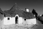 Foto scattata ad Alberobello, successiva conversione in B/N con relativa modifica delle curve di colore. 
Dati EXIF:
Apertura diaframma f8
tempo di esposizione: 1/640
ISO:100
lunghezza focale: 7.1mm
Suggerimenti e critiche sempre ben accetti.