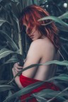 Red hair and green plants Red hair and green plants